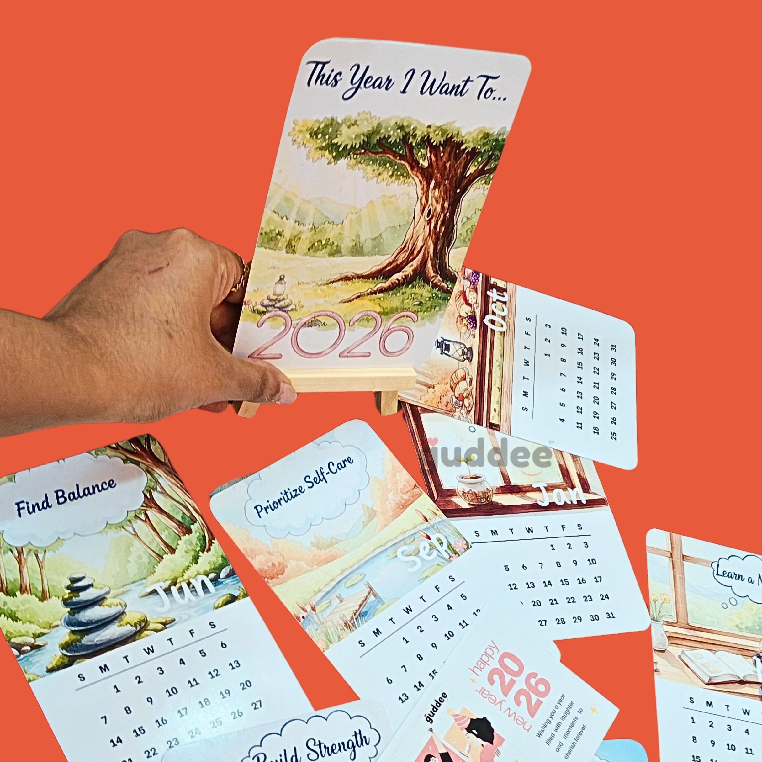 Close-up of the motivational text and goal-setting prompts on Guddee's handcrafted 2026 desk calendar.