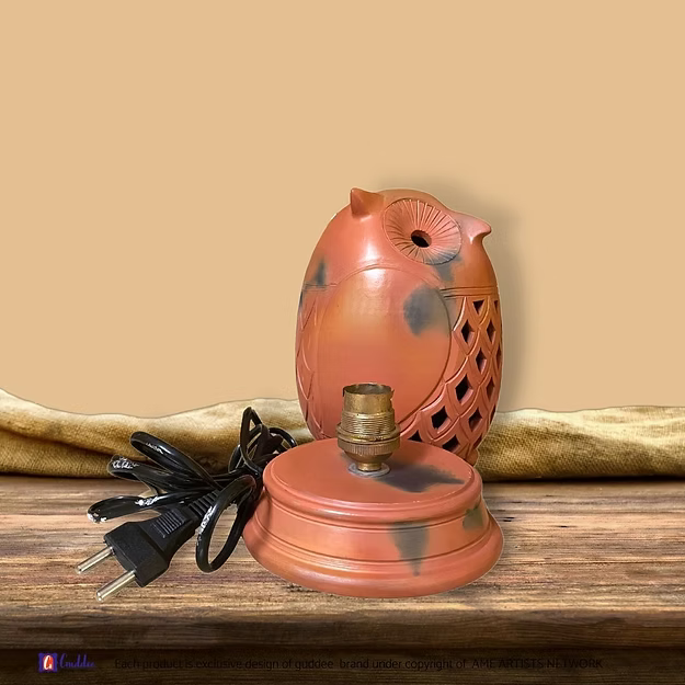 Close-up of the rustic texture and durable reverse fired clay surface on an authentic Rajasthan terracotta lamp.