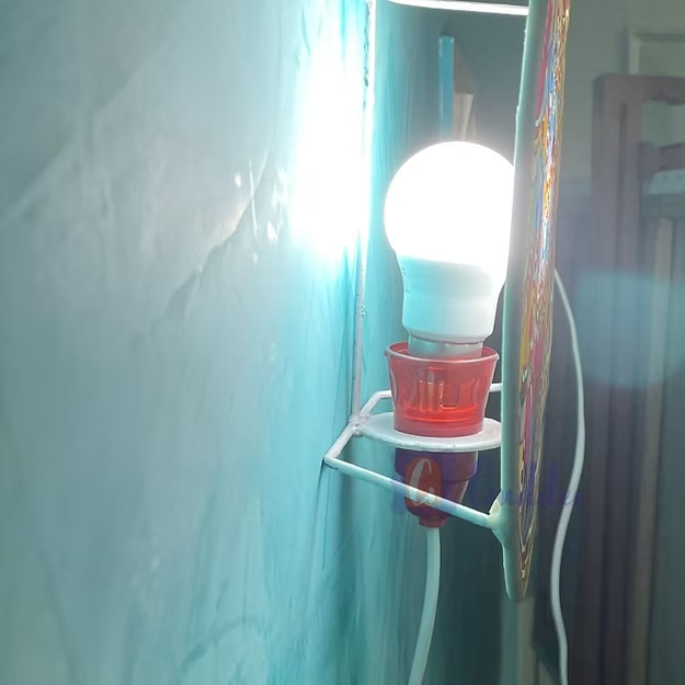Circle Lotus faux leather electric wall decor bulb lamp showing the internal socket assembly by Guddee.