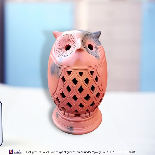 Handcrafted owl quirky terracotta clay table lamp showing the detailed jaali lattice artwork by Guddee.