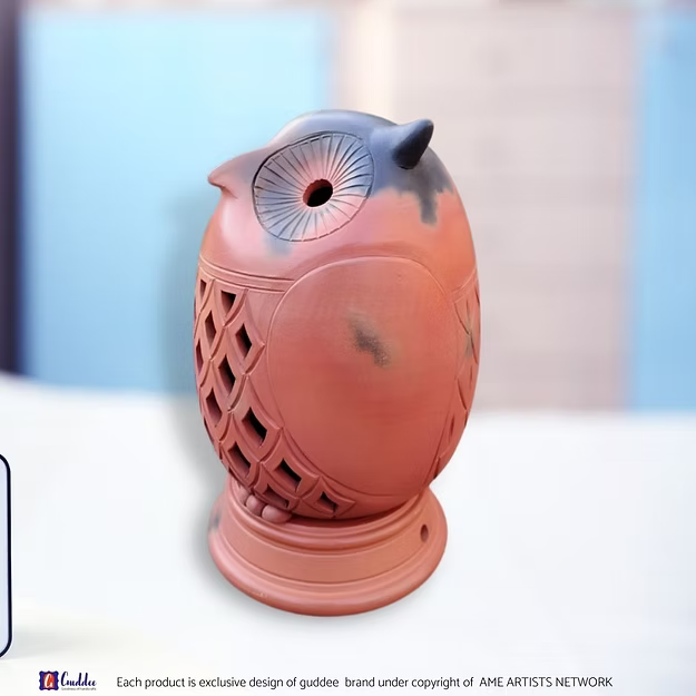 Close-up of the rustic texture and durable reverse fired clay surface on an authentic Rajasthan terracotta lamp.