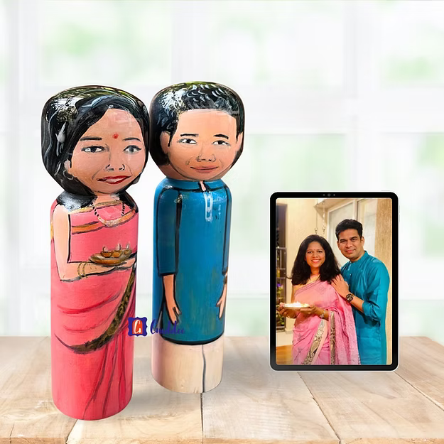 Personalised couple wedding anniversary doll in medium size showing custom hand painted attire details by Guddee.
