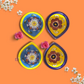 Set of 4 mix colours floral blue pottery diya lamps hand-painted in traditional vibrant colors by Guddee.