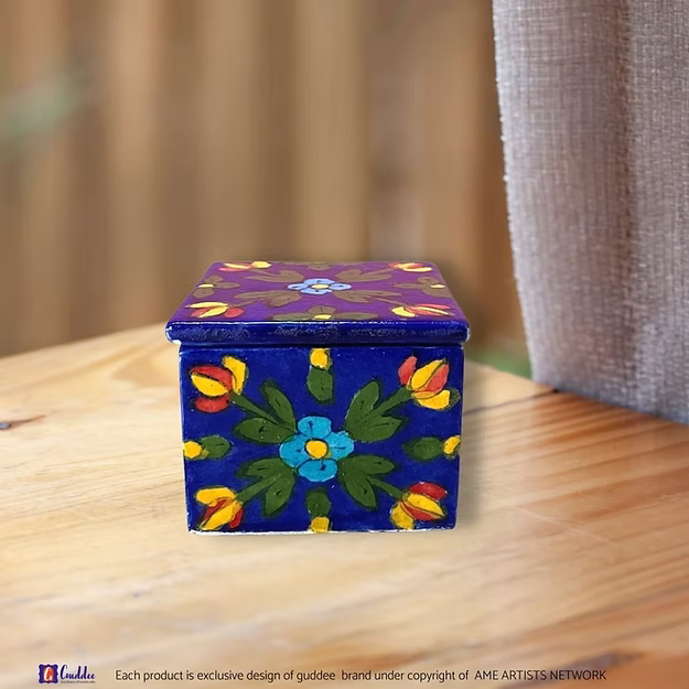 Mini floral blossom storage blue pottery box showing the hand-painted traditional blossom design and lid by Guddee.