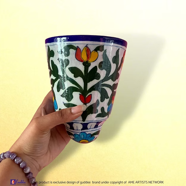 Rangeen Deewana blue pottery wall planter pot showing the vibrant colorful hand-painted floral motifs by Guddee.