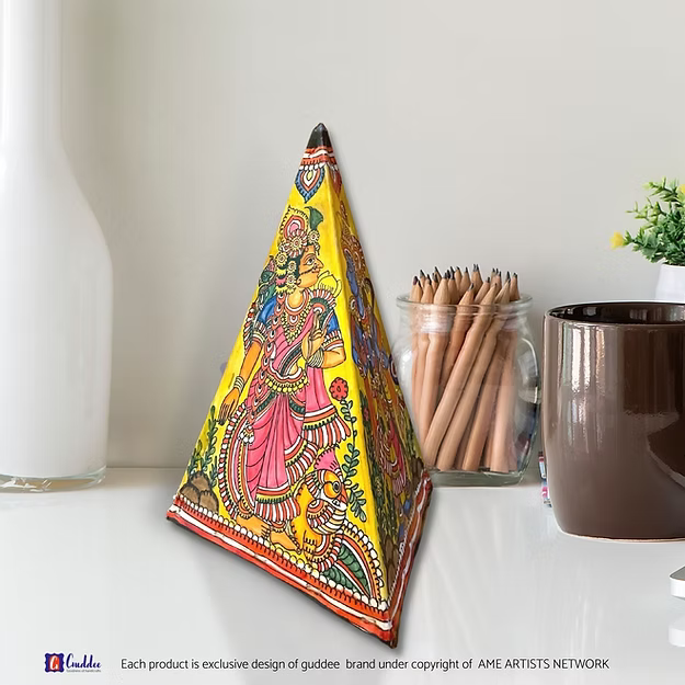 Close-up of the detailed Ram Sita cutout silhouette on Guddee's heat-resistant triangle faux leather candle stand lamp.
