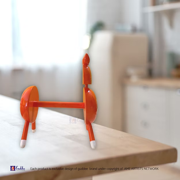 Close-up of the smooth, snag-free paper dispenser slot on Guddee's premium handcrafted orange cat accessory organizer.