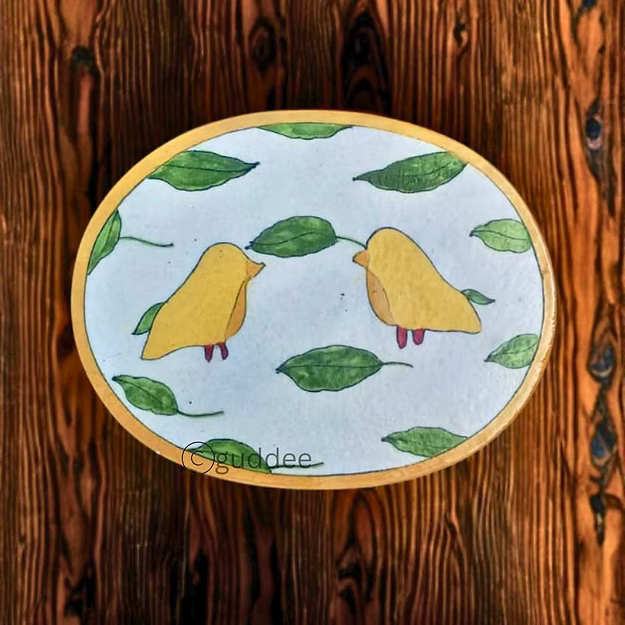 Bird motif handcrafted blue pottery table decor mat