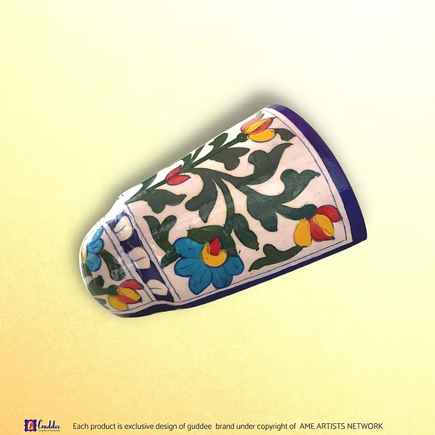 Rangeen Deewana blue pottery wall planter pot showing the vibrant colorful hand-painted floral motifs by Guddee.