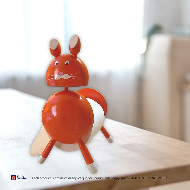 Cat orange tissue paper accessory holder showing the front tissue slot and bright stylized silhouette by Guddee.