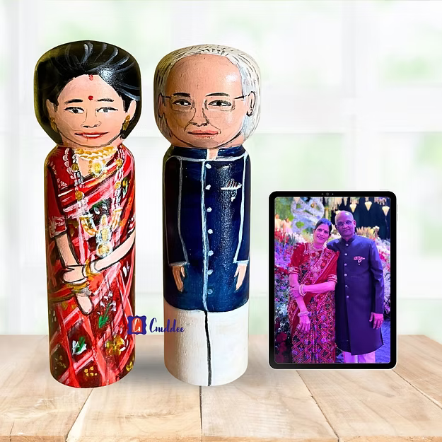 Personalised couple wedding anniversary doll in medium size showing custom hand painted attire details by Guddee.