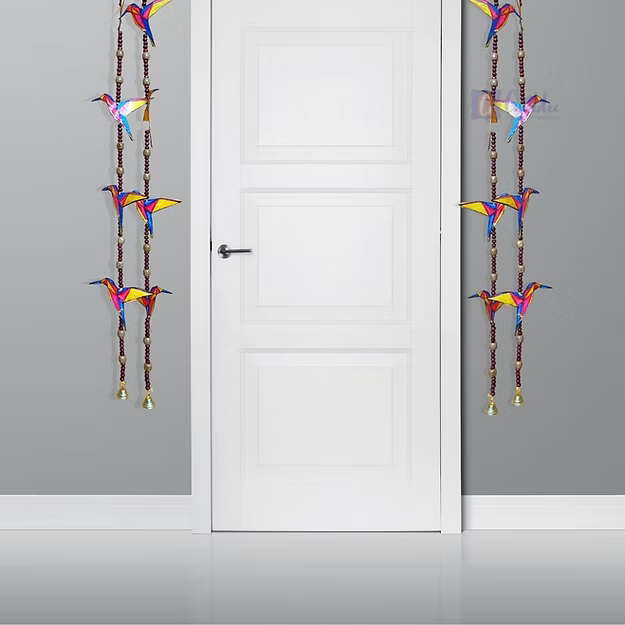 Symmetrical vertical synthetic leather bird hanging panels styled beautifully on either side of a modern living room hallway.