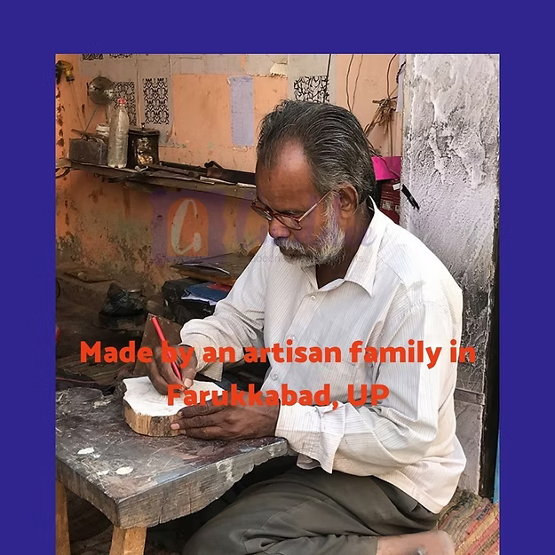 Man working on a craft in a workshop with text about an artisan family from Farukhabad, UP.