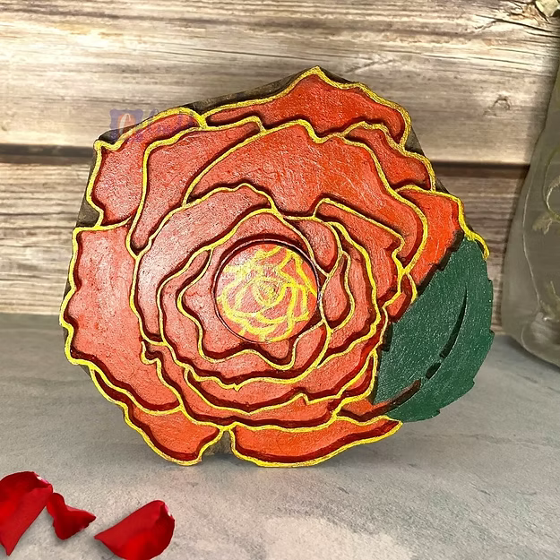 Rose sheesham wood wall candle sconce by Guddee featuring elegant hand-carved floral tea light accents.