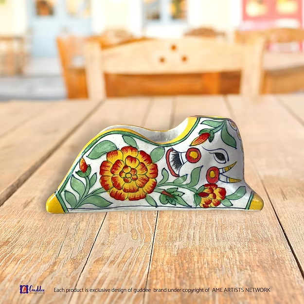 Marigold blue pottery tissue paper spoon holder dining decor showing the vibrant hand-painted floral motifs by Guddee.