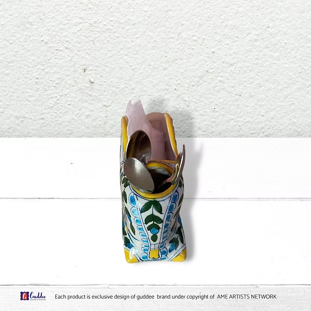 Fun Bright blue pottery tissue paper spoon holder dining decor showing the vibrant hand-painted floral motifs by Guddee.