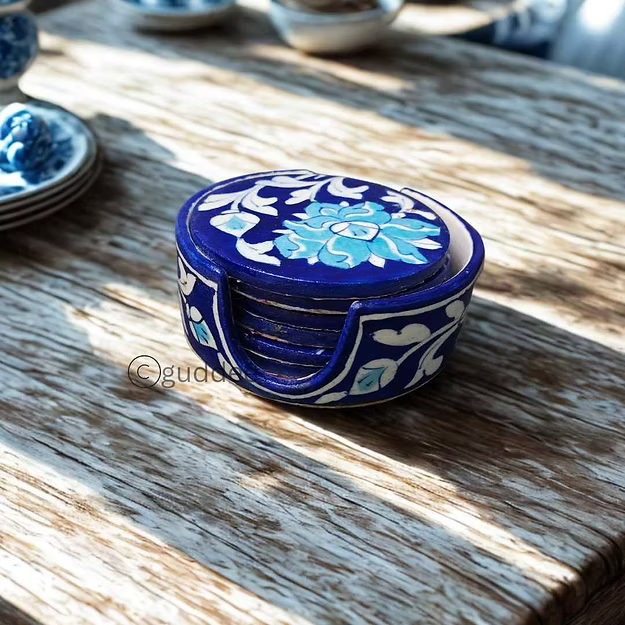 Blue pottery dark blue coaster set of 5 with holder showing the hand-painted traditional motifs by Guddee.