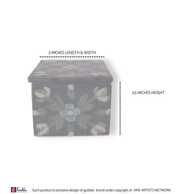 Close-up of the smooth glass-glazed surface and intricate floral blossom brush patterns on an authentic clay-free quartz box.