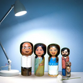 Set of 5 personalized wood dolls hand-painted to look like a family of five from a custom family portrait photo.
