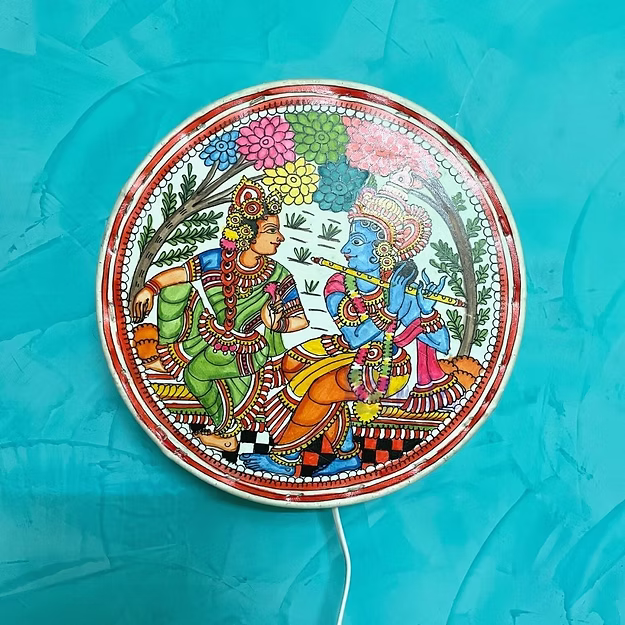 Circle Radha Krishna faux leather electric wall decor bulb lamp showing the internal socket assembly by Guddee.